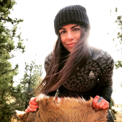 Charcoal gray Wazoo Cache Beanie worn by the legendary Laura Zerra