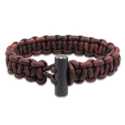 fire starter bracelet made with brown leather and firesteel toggle