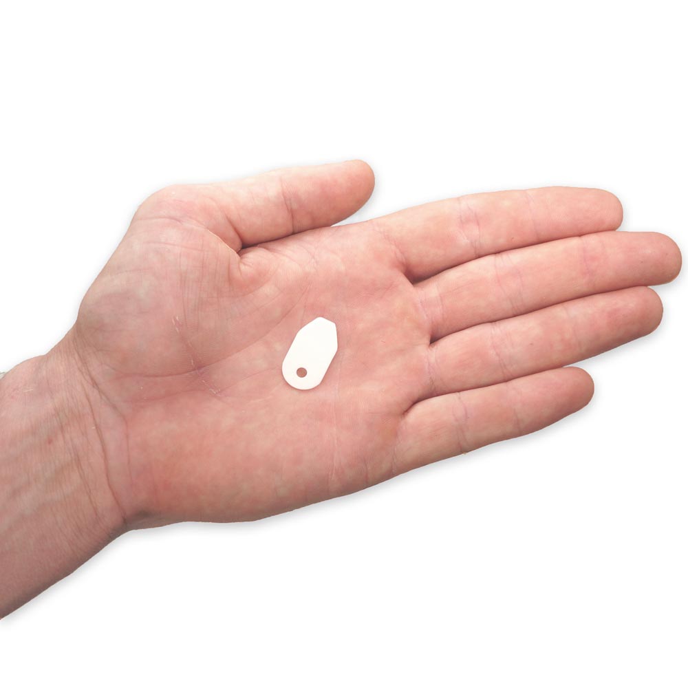white ceramic striker with hole for paracord or other cordage