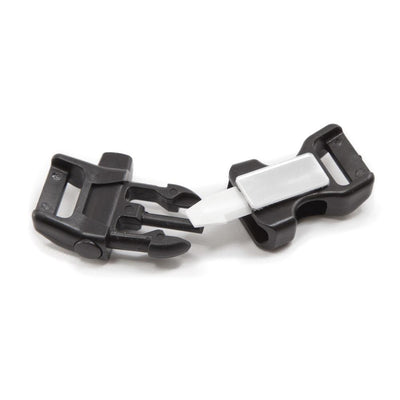 backside of survival buckle unclasped with ceramic scraper whistle and signal mirror used for survival bracelets