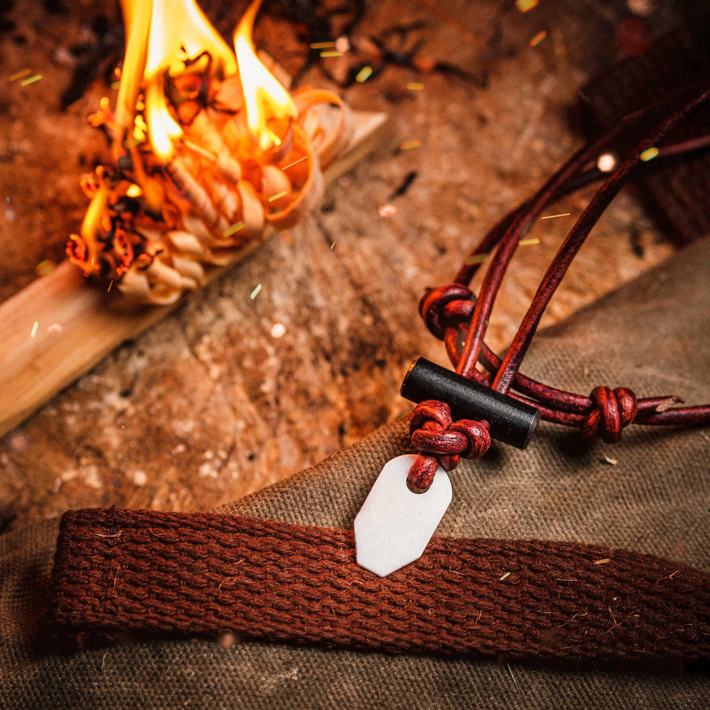 Fire glow lighting on the Bushcraft necklace with white ceramic by Wazoo